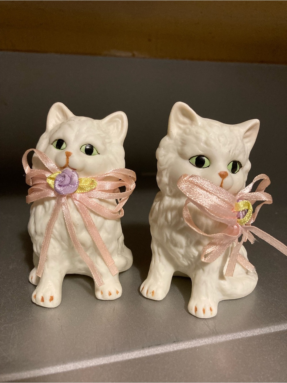 White ceramic Cat Figurine Pair with Pink Ribbon Accent